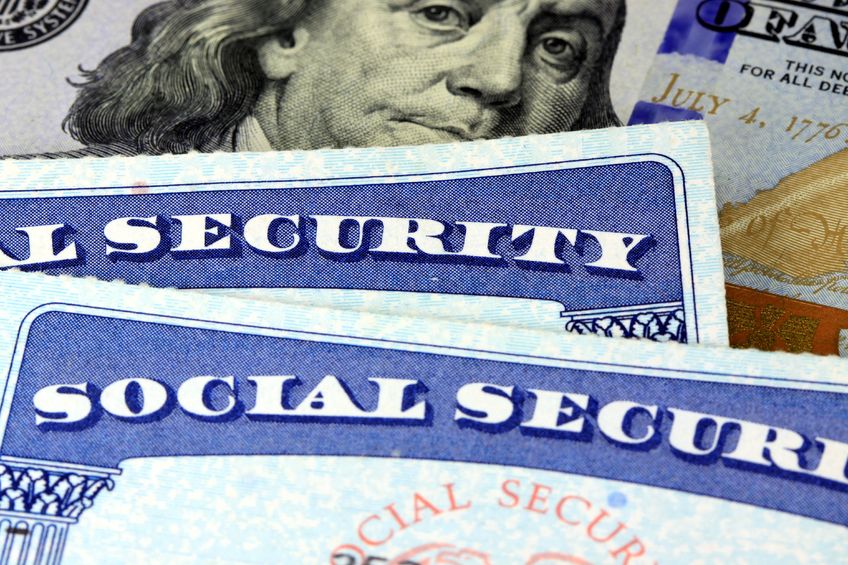 Social security card and $100 bill